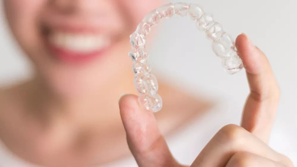 Invisalign vs. Braces: Cost, Time, and Pain - Quest Orthodontics